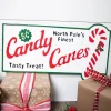 23.6” Metal Holiday North Pole’s Finest Candy Canes Wall Sign
