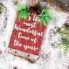 5” Wood Holiday Sign Ornament with Pinecone Accent