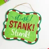 11" x 9" Red White Green Glitter Sign - "Stink! Stank! Stunk!"